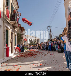 Corfians at the small town of Lefkimmi throw clay pots from windows and balconies on Holy Saturday to celebrate the Resurrection of Christ. Stock Photo