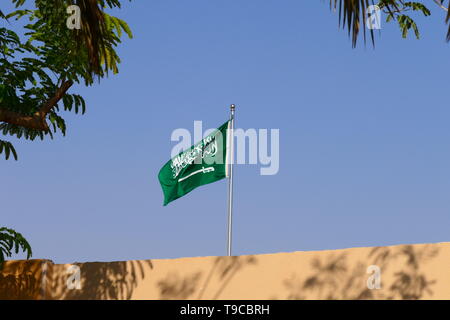 The flag of the Kingdom of Saudi Arabia waving in the historic Diriyah Stock Photo