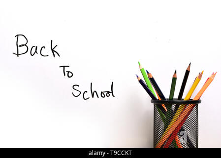 Back to school text with pencil container isolated on white background Stock Photo