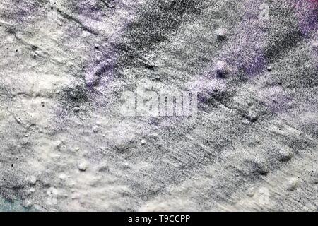 High resolution texture of colorful graffiti paint on conrete and brick walls in red blue purple and silver Stock Photo