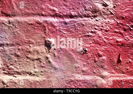 High resolution texture of colorful graffiti paint on conrete and brick walls in red blue purple and silver Stock Photo