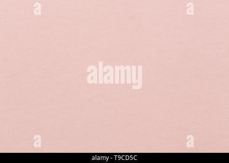 Light pink textured decoration paper. Bright pink background. Stock Photo