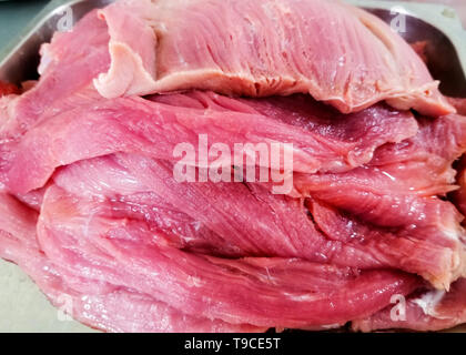 several pork steak one on top of the other Stock Photo