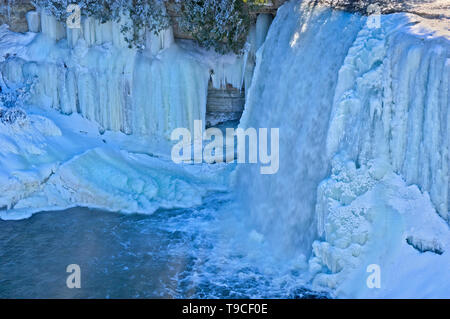 The Kagawong River flows over icy Bridal Veil Falls. Manitoulin Island Kagawong Ontario Canada Stock Photo