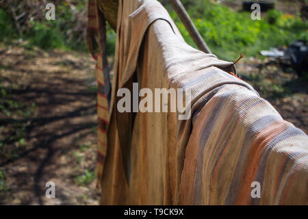 Closeup floor mats are dried on the fence, background or concept. Stock Photo
