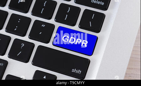 Text GDPR on blue keyboard button, closeup Stock Photo