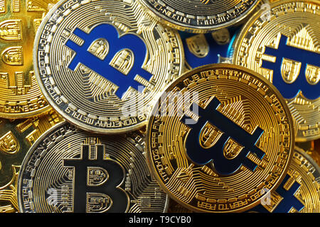Many golden and silver bitcoins Stock Photo