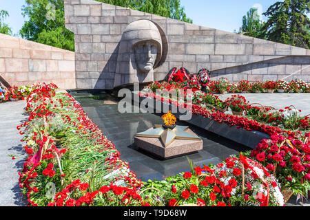 Samara, Russia - May 10, 2019: Memorial Complex and Eternal Fire on Glory Square and flowers in memory of the Victory in the Great Patriotic War Stock Photo