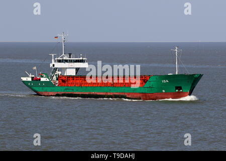 The cargo ship Ida passes on 15 April 2019 Cuxhaven and continues to Hamburg. Stock Photo