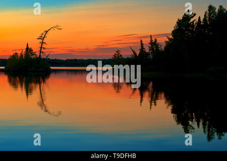 Reflection on Lac des Sables at sunset Belleterre Quebec Canada Stock Photo