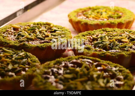 Pistachio cake with a creamy sauce Stock Photo