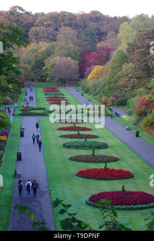 Cathedral Walk, Formal Procession by Flowerbeds on an Autumn Evening. Seaton Park, Old Aberdeen, Scotland, UK. Stock Photo