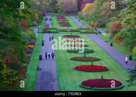 Cathedral Walk, Formal Procession by Flowerbeds on an Autumn Evening. Seaton Park, Old Aberdeen, Scotland, UK. Stock Photo