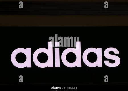 pharmacist Clothes Spanish Close up of Adidas logo Stock Photo - Alamy