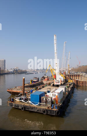 Construction work on the River Thames in London, England Stock Photo