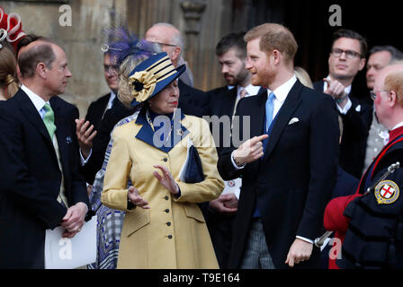 (centre) Britain's Prince Harry,right, and Anne, Princess Royal, center left, leave the chapel after the wedding of Lady Gabriella Windsor and Thomas Kingston at St George's Chapel, Windsor Castle. Stock Photo