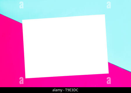 Colorful of soft blue and pink paper background with white paper frame for text Stock Photo