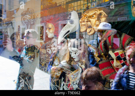 Venetian masks and reflections. Stock Photo