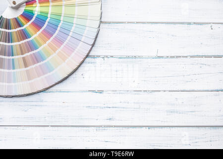 Color palette for painting on a wooden table - top of view. Stock Photo