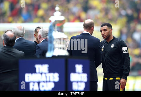 The Duke of Cambridge (centre right) shakes hands with Watford's Troy Deeney (right) at the start of the FA Cup Final at Wembley Stadium, London. Stock Photo