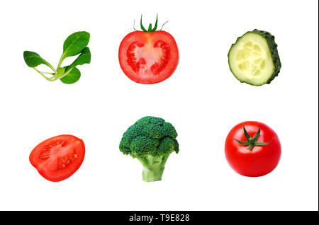 Different ripe fresh vegetables on white isolated background. Cucumbers, tomatoes, broccoli, spinach, closeup Stock Photo
