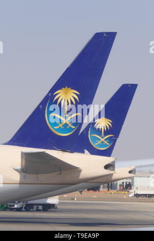 JEDDAH, SAUDI ARABIA - DECEMBER 22, 2018: Two SAUDIA Airplanes on the King Abdulaziz International Airport Stock Photo