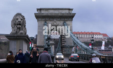 Budapest Hungary 03 15 2019 locals celebrate the national holiday on the Chain Bridge in Budapest Stock Photo