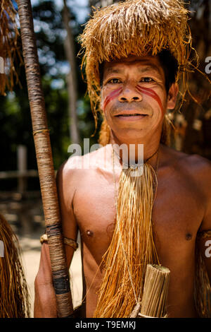 Portrait of a Yagua tribe male member holding a blowpipe (or pucuna) on ...