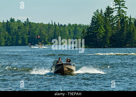 Boating on Lake of the Woods Kenora Ontario Canada Stock Photo