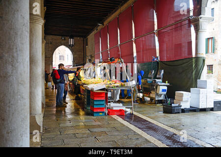 VENICE, ITALY -8 APR 2019- Fresh seafood for sale at the Rialto farmers market (Mercato di Rialto) in Venice, near the Rialto Bridge and the Grand Can Stock Photo