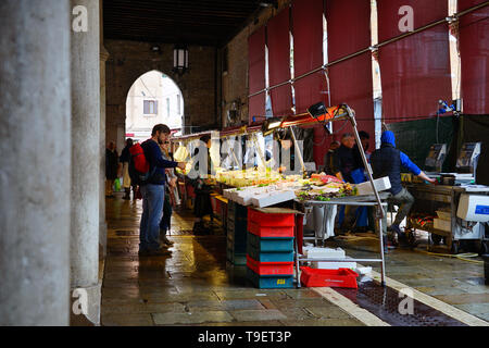 VENICE, ITALY -8 APR 2019- Fresh seafood for sale at the Rialto farmers market (Mercato di Rialto) in Venice, near the Rialto Bridge and the Grand Can Stock Photo