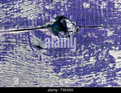 old blue board with cracked paint, vintage wood background, grunge plank. Old wooden background with remains of pieces of scraps of old paint on wood. Stock Photo