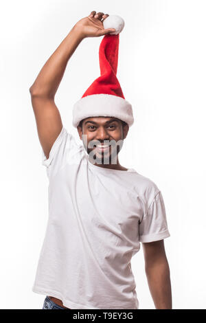 Indian man in santa hat isolated on white background Stock Photo