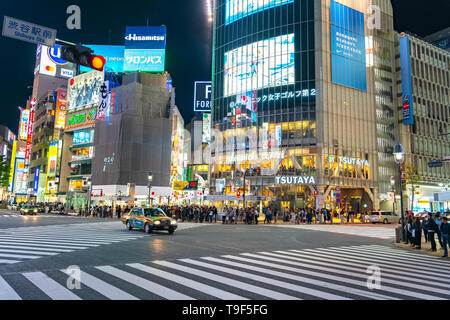 Shibuya Crossing is one of the busiest crosswalks in the world. Pedestrians crosswalk at Shibuya district. Tokyo, Japan Stock Photo