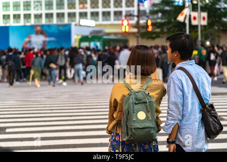 Shibuya Crossing is one of the busiest crosswalks in the world. Pedestrians crosswalk at Shibuya district. Tokyo, Japan Stock Photo