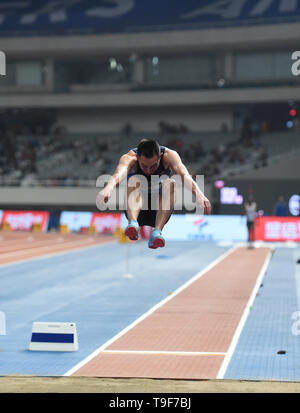 Shanghai. 18th May, 2019. Zhang Yaoguang of China competes during the Men's Long Jump of 2019 IAAF Diamond League in east China's Shanghai Municipality on May 18, 2019. Credit: Jia Yuchen/Xinhua/Alamy Live News Stock Photo