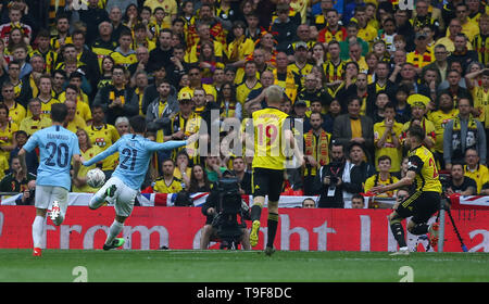 London, UK. 18 May 2019 Manchester City's David Silva scores the opening goal during the Emirates FA Cup Final between Manchester City and Watford at the Wembley Stadium in London. 18 May 2019. EDITORIAL USE ONLY. No use with unauthorized audio, video, data, fixture lists, club/league logos or 'live' services. Online in-match use limited to 120 images, no video emulation. No use in betting, games or single club/league/player publications. Credit: James Boardman / Alamy Live News Stock Photo