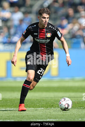 Berlin, Germany. 18th May, 2019. Soccer: Bundesliga, Hertha BSC - Bayer Leverkusen, 34th matchday. Leverkusen's Kai Havertz runs the ball across the pitch. Credit: Andreas Gora/dpa - IMPORTANT NOTE: In accordance with the requirements of the DFL Deutsche Fußball Liga or the DFB Deutscher Fußball-Bund, it is prohibited to use or have used photographs taken in the stadium and/or the match in the form of sequence images and/or video-like photo sequences./dpa/Alamy Live News Stock Photo