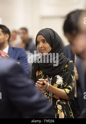 Texas, USA. 18th May, 2019. Congresswoman Ilhan Omar of Minnesota's 5th Congressional District listens at Austin's annual city-wide iftar dinner in honor of the 14th day of Ramadan. Omar was joined by Mayor Steve Adler to call for peace and harmony in today's divisive climate. Credit: ZUMA Press, Inc./Alamy Live News Stock Photo