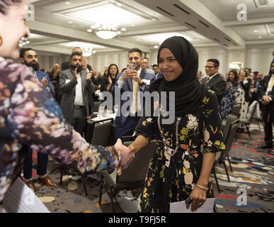 Texas, USA. 18th May, 2019. Congresswoman Ilhan Omar of Minnesota's 5th Congressional District is introduced at Austin's annual city-wide iftar dinner in honor of the 14th day of Ramadan. Omar was joined by Mayor Steve Adler to call for peace and harmony in today's divisive climate. Credit: ZUMA Press, Inc./Alamy Live News Stock Photo