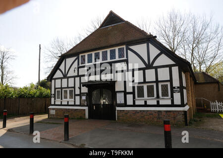 The Aldenham War Memorial Hall, Letchmore Heath, Hertfordshire.  It is inscribed with the dates 1914 and 1918. Stock Photo