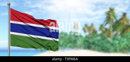 Gambia flag waving in the deep blue sky background. Isolated national ...