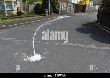White paint spill, Frome, UK Stock Photo