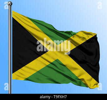 Jamaica flag waving in the deep blue sky background. Isolated national flag. Macro view shot. Stock Photo