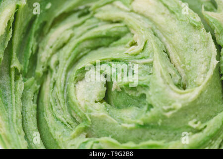 Close up on green cookie dough. Saint Patricks Day and Easter baking concept. Top view, flat lay, copy space. Stock Photo