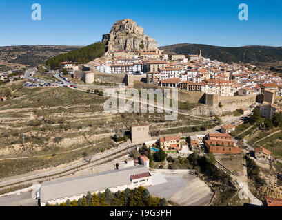 Picturesque aerial view of walled city Morella with medieval Castle on rocky hilltop, Castellon, Spain Stock Photo