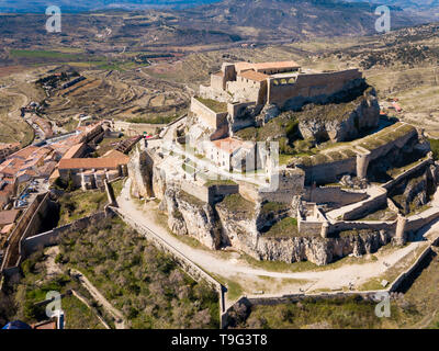 Aerial view of Castillo de Morella - multilevel castle on rock top in ancient Spanish walled city Morella Stock Photo