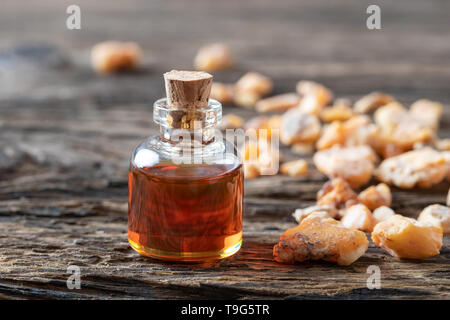 A transparent bottle of styrax benzoin essential oil and resin Stock Photo