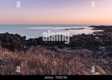 Beautiful Jeju seaside thats been touch by a little of golden morning sun. Stock Photo