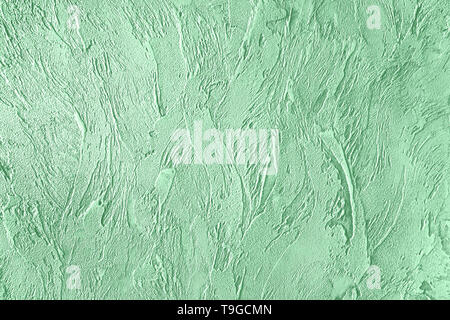 Trendy mint colored rouge concrete textured background for concept or product. Toned image. Stock Photo